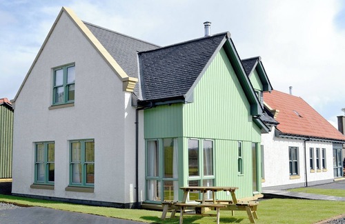 Linlithgow Cottage | A rural property based on a working farm with wood burner.