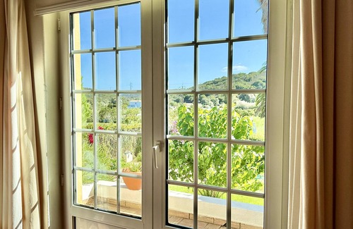 Bensafrim Villa | A south-facing, Mediterranean-style villa on 2 levels, walled and gated in a tranquil country setting, yet only 10 minutes from the popular historic, seafront city of Lagos in the Western Algarve
