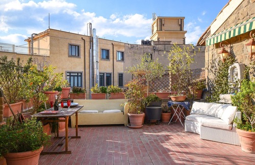 Viterbo Apartment | A striking holiday apartment in a medieval town.