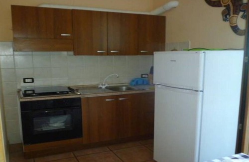 Loreto House | A studio apartment that brings summer inside