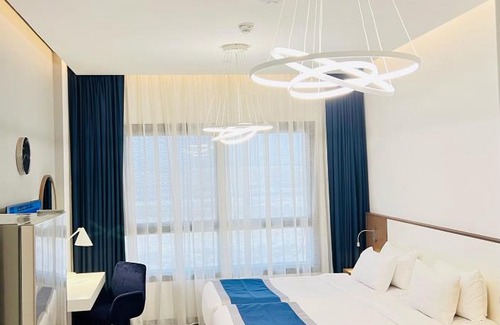 Dubai Investment Park Apartment | ABAR HOTEL APARTMENTS DIP-1