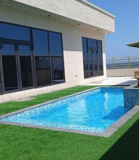Al Ashkharah Ski Chalet | Acacia Beach Villa