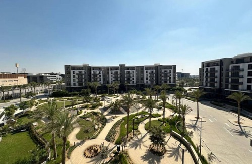 New Cairo Apartment | Access-lux smart home with garden and shared pool