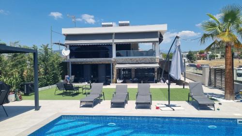 Pangaio Villa | Agia Lydia Sea View Suite House
