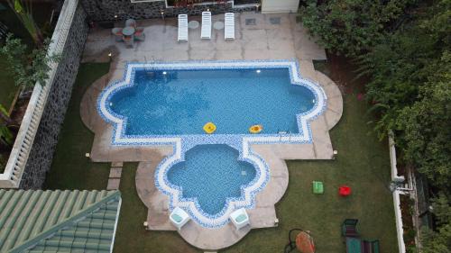 St.Stanislaus Villa Villa | Akbar Villa Spacious 4BHK Grand Pool at TranqVillas