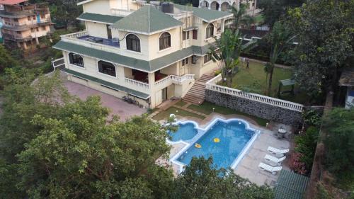 St.Stanislaus Villa Villa | Akbar Villa Spacious 4BHK Grand Pool at TranqVillas