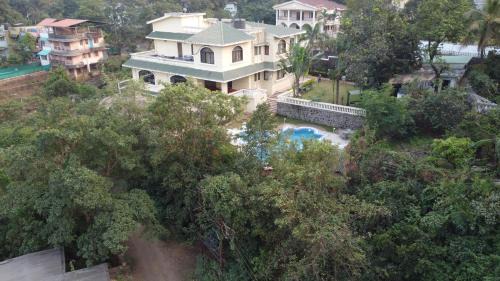 St.Stanislaus Villa Villa | Akbar Villa Spacious 4BHK Grand Pool at TranqVillas