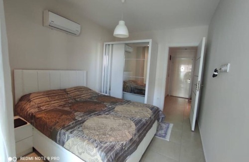 Avsallar Apartment | Akdeniz kıyısına çok yakın.Muhteşem kumsalında deniz ve havuzun keyfini çıkarın.