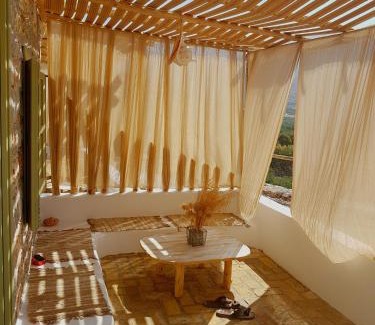 Tholaria House | Aliori art caves