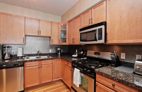 Jefferson Park Condo | All new furniture, heated garage, newer building location makes this a MUST!