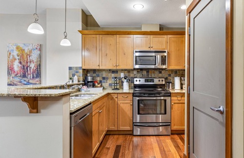 Town Centre Condo | Alluring Mountain View Condo - The Heart Of Downtown!