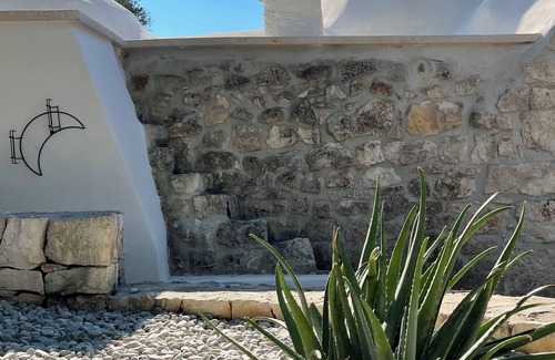 Ceglie Messapica Villa | ALMAPULIA beautiful trulli with private pool and veranda among Apulian olive trees