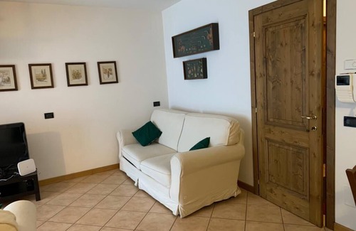 Valdisotto Apartment | Alpine apartment with a view of the mountain with the Olympic slopes of Bormio