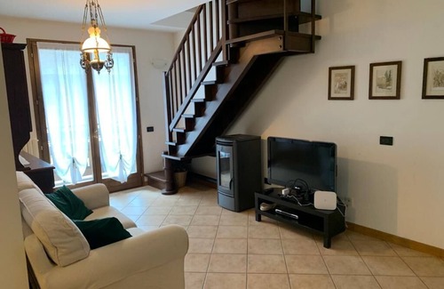 Valdisotto Apartment | Alpine apartment with a view of the mountain with the Olympic slopes of Bormio