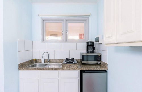 Boegoeroei Apartment | Amazing 2BR 1BA w Pool Close to the Beach BBQ