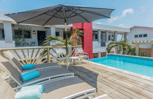Boegoeroei Apartment | Amazing 2BR 1BA w Pool Close to the Beach BBQ