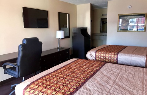 Saks Hotel | American Inn