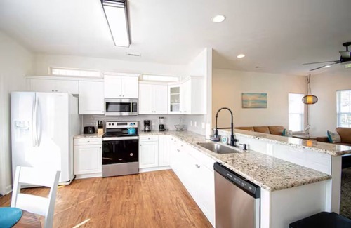 Southport House | amily Fun~ Dog Friendly~ Home with Pool Access!