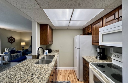 Holiday Isle Condo | Anchors Away - Unit 1040 on the Canal offers Free Beach Service!