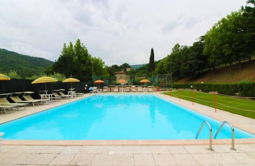 Bivio Lugnano Villa | Ancient stone farmhouse with private swimming pool and tennis court. On the border between Tuscany a