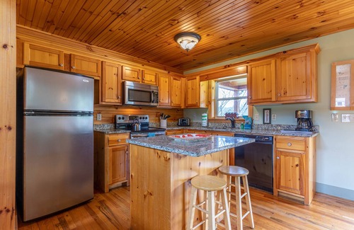 Todd Cabin | Andrews River Haven - River Front with hot tub-Cozy, Fun for Kids, Pet Friendly!