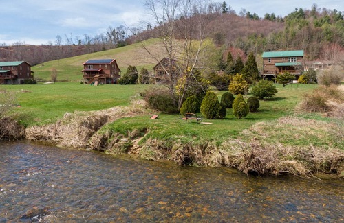 Todd Cabin | Andrews River Haven - River Front with hot tub-Cozy, Fun for Kids, Pet Friendly!