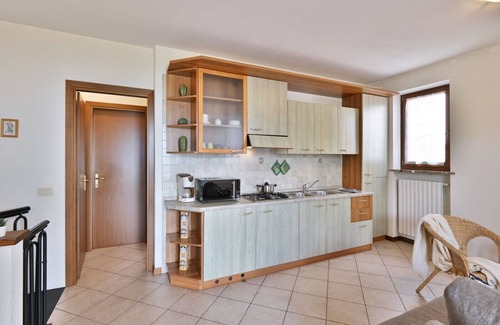 Prabione Apartment | Angelica 5 by Theater Home, with fenced garden and lake view