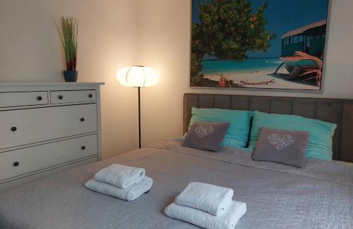 Wola Apartment | Apartament JK 47 A z miejscem postojowym w garażu