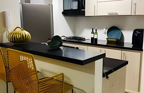 Cali Apartment | Apartamento con aire, hamaca, piscina y gym