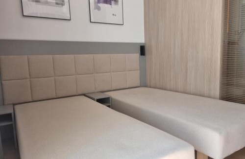 Wola Apartment | Aparthotel in Warsaw very close to the city center, free underground parking, WiFi, air conditioning, balcony