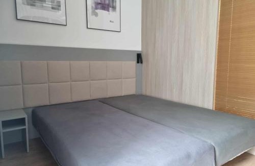 Wola Apartment | Aparthotel in Warsaw very close to the city center, free underground parking, WiFi, air conditioning, balcony
