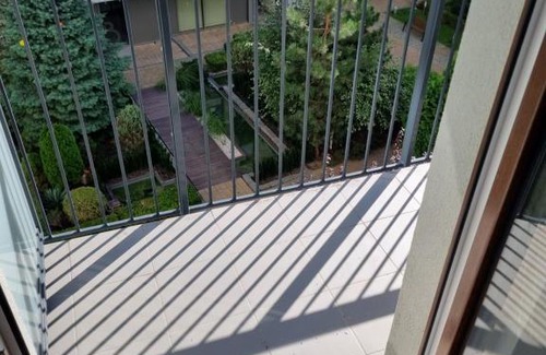 Wola Apartment | Aparthotel in Warsaw very close to the city center, free underground parking, WiFi, air conditioning, balcony