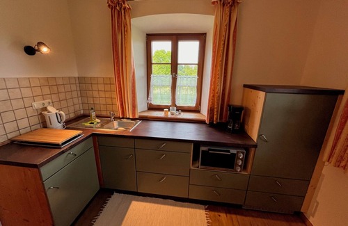 Breitbrunn a. Chiemsee Apartment | Apartment Sissi for 2 people on the upper floor, 27 sqm, 1 living room/bedroom with kitchen, shared balcony