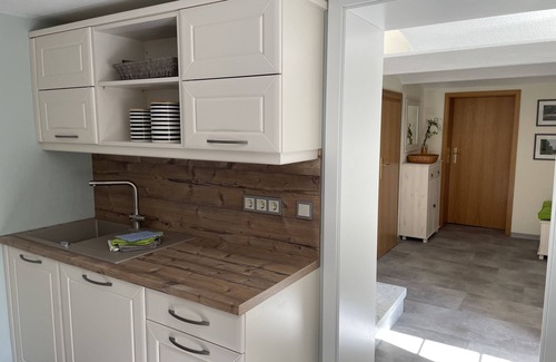 Burg Apartment | Apartment 1 in a quiet, idyllic holiday property, directly on the river with a large garden
