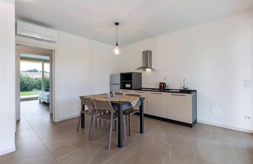Montioni Apartment | Apartment 'Agriturismo Le Campagnole Pink' with Shared Pool, Wi-Fi and Air Conditioning