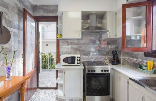 Oliva Apartment | Apartment 'Apartamento En Playa Acogedor' with Private Terrace, Wi-Fi and Air Conditioning