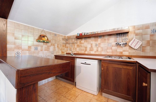 Manerba del Garda Apartment | Apartment 'Appartamento Rupestre 2.0' with Private Terrace, Private Garden and Wi-Fi