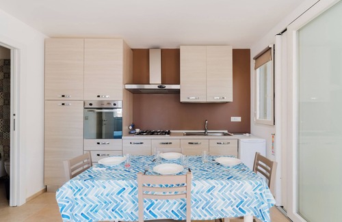 Santa Maria al Bagno Apartment | Apartment 'Bouganvillea' with Sea View, Shared Terrace and Air Conditioning