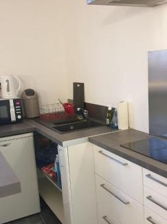Beauzelle Apartment | apartment building features laundry facilities