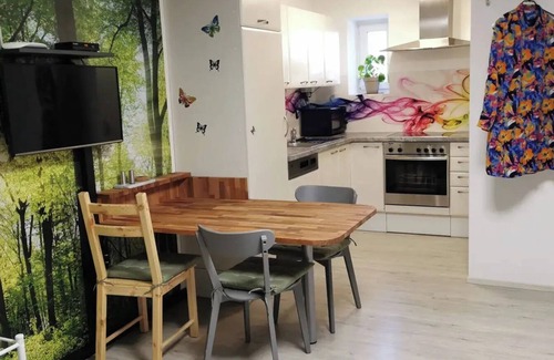 Moetz Apartment | Apartment Butterfly umrahmt von Bergen