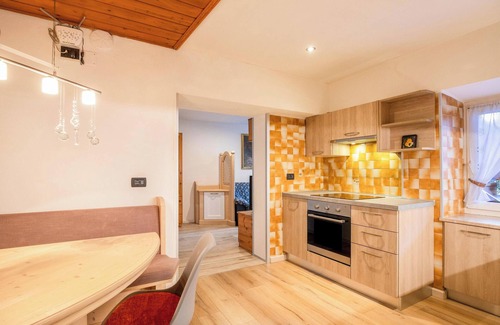 Campitello di Fassa Apartment | Apartment "Chalet Osmar 1" with Mountain View, Wi-Fi, Garden & Terrace