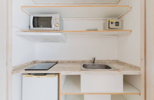 Tuglie Apartment | Apartment 'Confort Dépendance Angolo Cottura' with Shared Pool, Wi-Fi and Air Conditioning