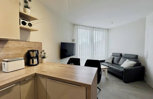 Duhnen Apartment | Apartment directly behind the dike for 2 persons, swimming pool, whirlpool, sauna