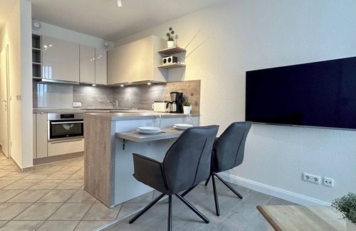 Duhnen Apartment | Apartment directly behind the dike for 2 persons, swimming pool, whirlpool, sauna