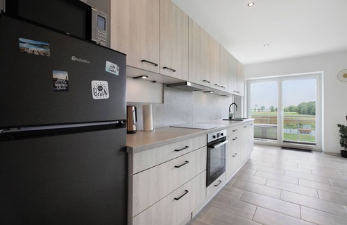 Schulp Apartment | Apartment 'Ferienhaus Ebbe Oben' with Private Garden, Balcony and Wi-Fi