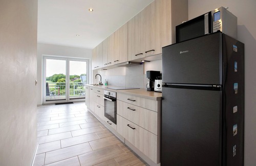 Schulp Apartment | Apartment 'Ferienhaus Flut Oben' with Private Garden, Balcony and Wi-Fi