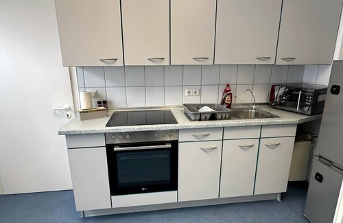 Nordhorn Apartment | Apartment Flixi III - Doppelzimmer für Zwei Personen mit Gemeinschaftsflächen
