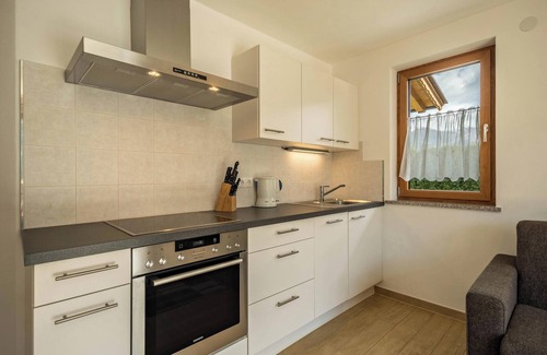 San Martino in Passiria Apartment | Apartment “ Pfandlerhof Rot” with Mountain View, Wi-Fi, Balcony & Garden