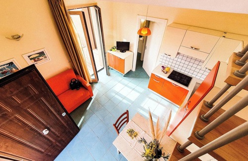 Cavo Apartment | Apartment 'La Pergola al Cavo 9' with Sea View, Shared Pool, Terrace & Wi-Fi