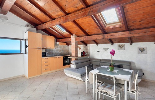 Cipressa Apartment | Apartment 'La Quiete Nel Bosco' with Sea View, Private Garden and Wi-Fi